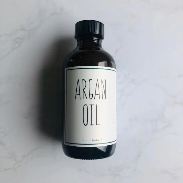 جعبه و بطری قطره‌چکان روغن آرگان خالص